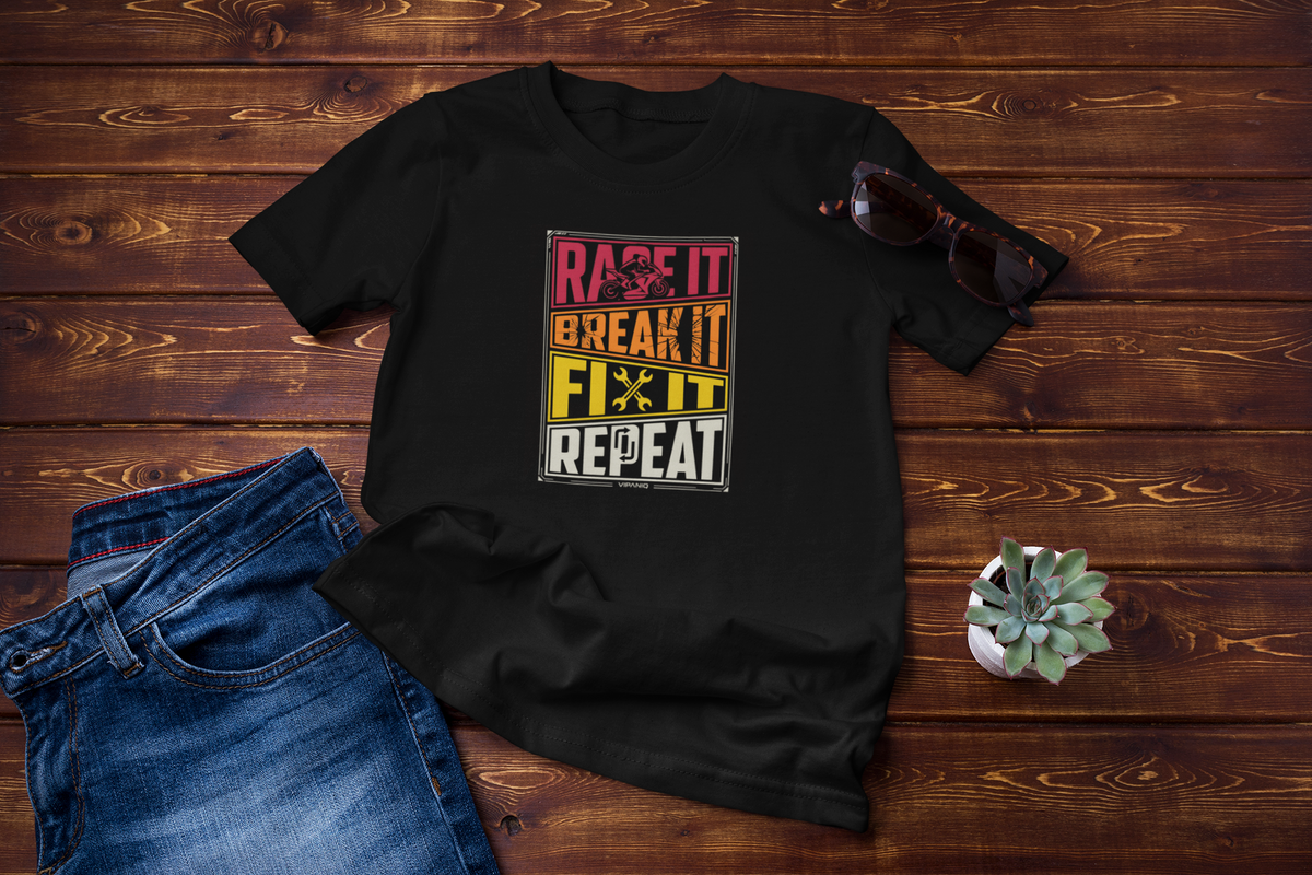 Ride It Break It Fix It Repeat graphic printed on a black oversized motorcycle rider T-shirt from VIPANIQ RIDE.