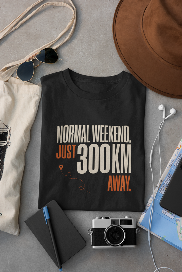 Black Vipaniq classic T-shirt with Normal Weekend Just 300 KM Away distance and route graphic.