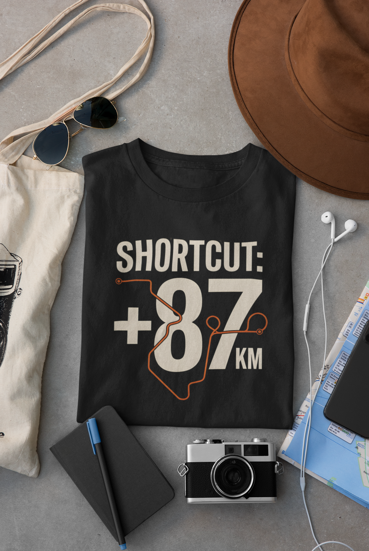 Black Vipaniq classic T-shirt with Shortcut +87 KM winding route graphic on the front.